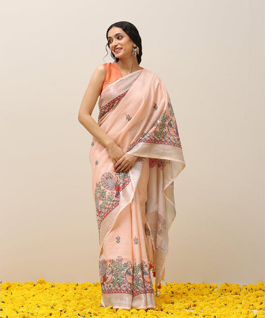 Light Peach Handloom Linen Handpainted Madhubani Saree With Peacock Motifs and Silver Tissue Border - Pre Order
