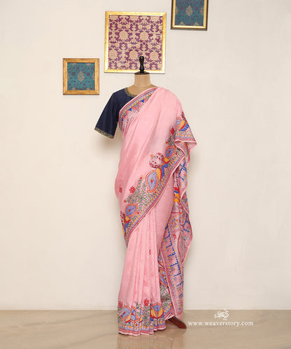 Light pink Chanderi saree with a broad paired bird border and scattered painted flowers.