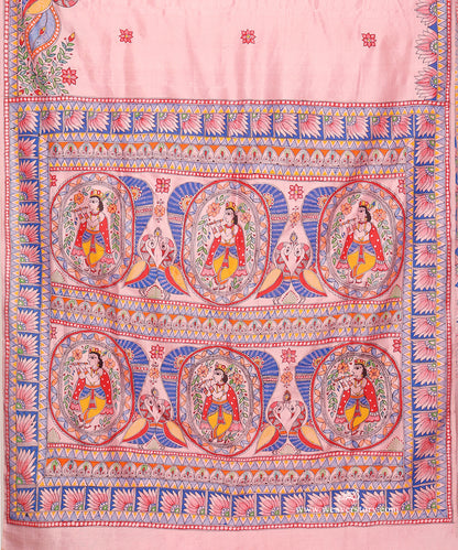Hand-painted Madhubani pallu with repeated images of Lord Krishna playing his flute, framed by floral bands.