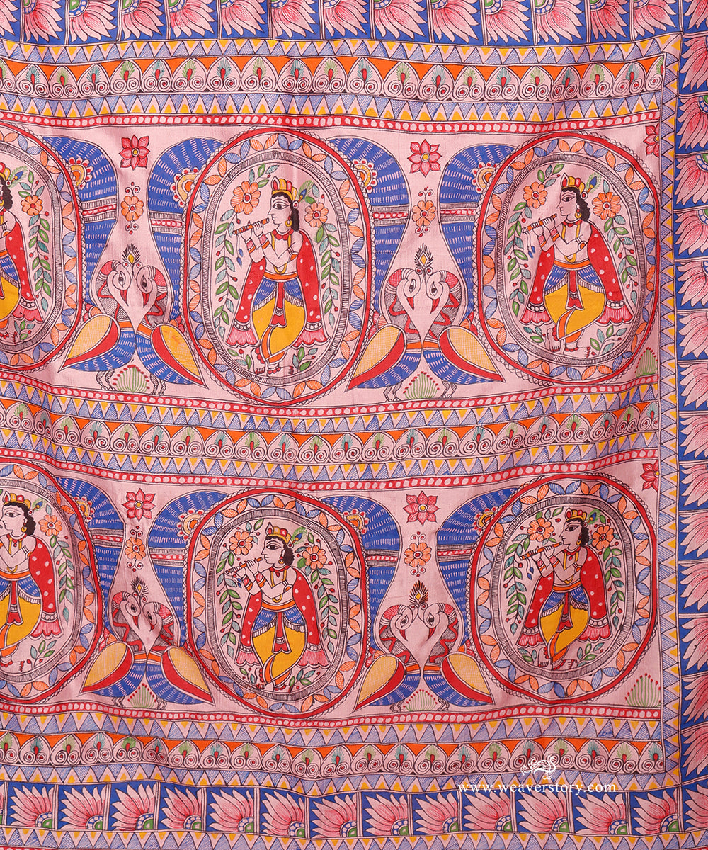 Close-up of the Madhubani Krishna pallu showing fine bamboo-pen work and rich blue, red and yellow details