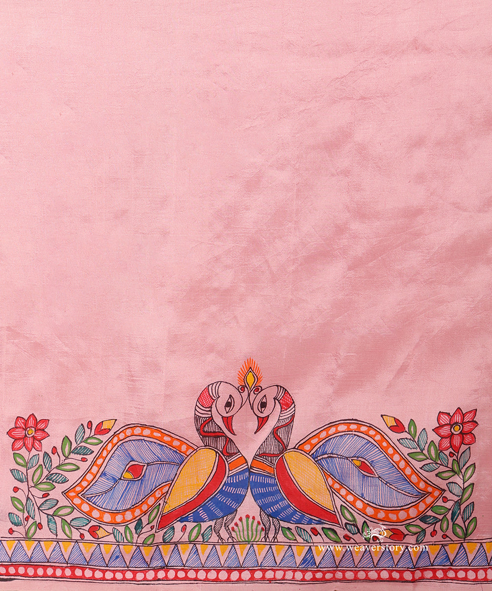 Paired Madhubani birds with intricate blue-and-orange feathers on a light pink saree border.