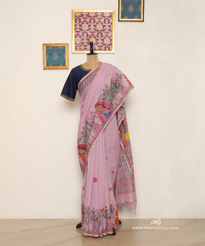 Mauve handloom Chanderi saree with painted village women, trees and scattered flowers.