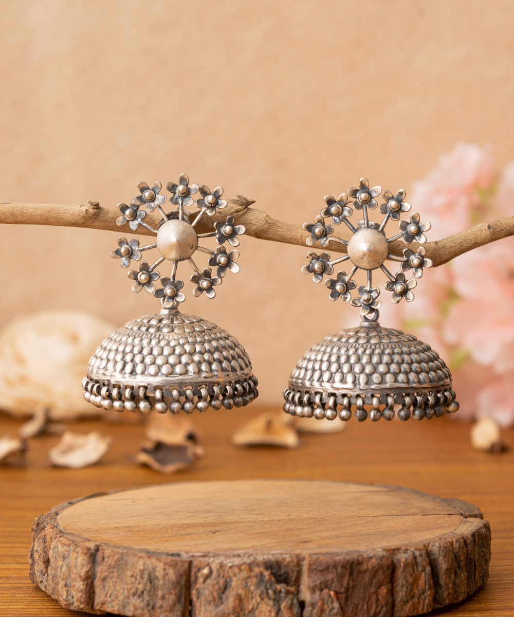 Zahida_Handcrafted_Oxidised_Pure_Silver_Jhumka_Earrings_With_Flower_Motifs_WeaverStory_01