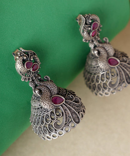 Jeeva_Handcrafted_Oxidised_Pure_Silver_Earrings_With_Kundan_And_Peacock_Motifs_WeaverStory_02