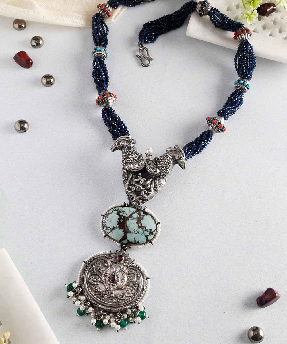 Bhuvika_Turquoise_Handcrafted_Oxidised_Pure_Silver_Necklace_With_Parrot_Motif_WeaverStory_01