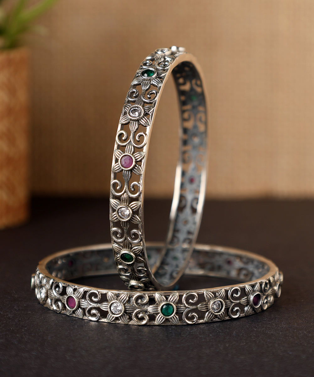 Aadhira_Handcrafted_Oxidised_Pure_Silver_Bangles_With_Floral_Motifs_WeaverStory_01