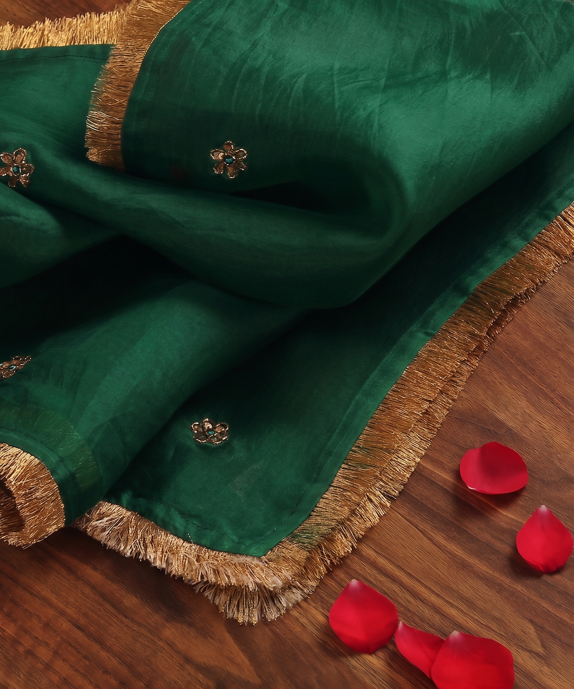 Deep green handloom silk organza dupatta with scattered zardozi floral motifs, turquoise meenakari accents and handcrafted metallic gold kiran edging.