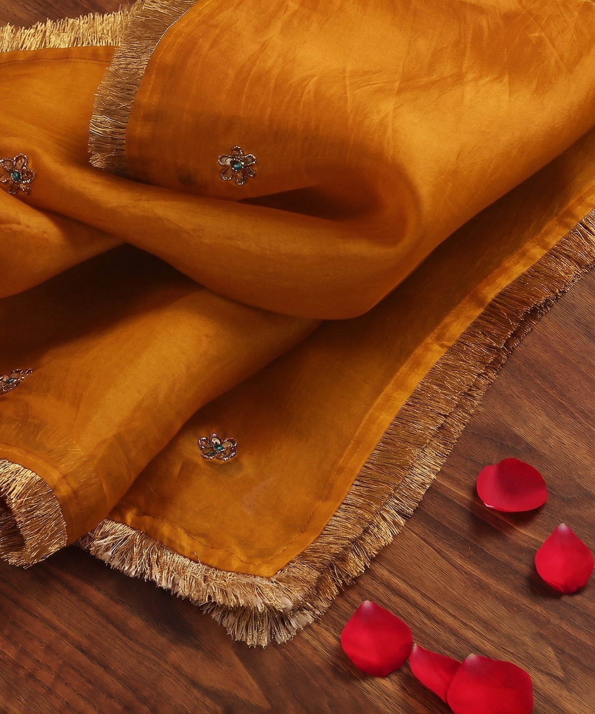Mustard handloom silk organza dupatta with scattered zardozi floral motifs, turquoise meenakari accents and handcrafted metallic gold kiran edging.