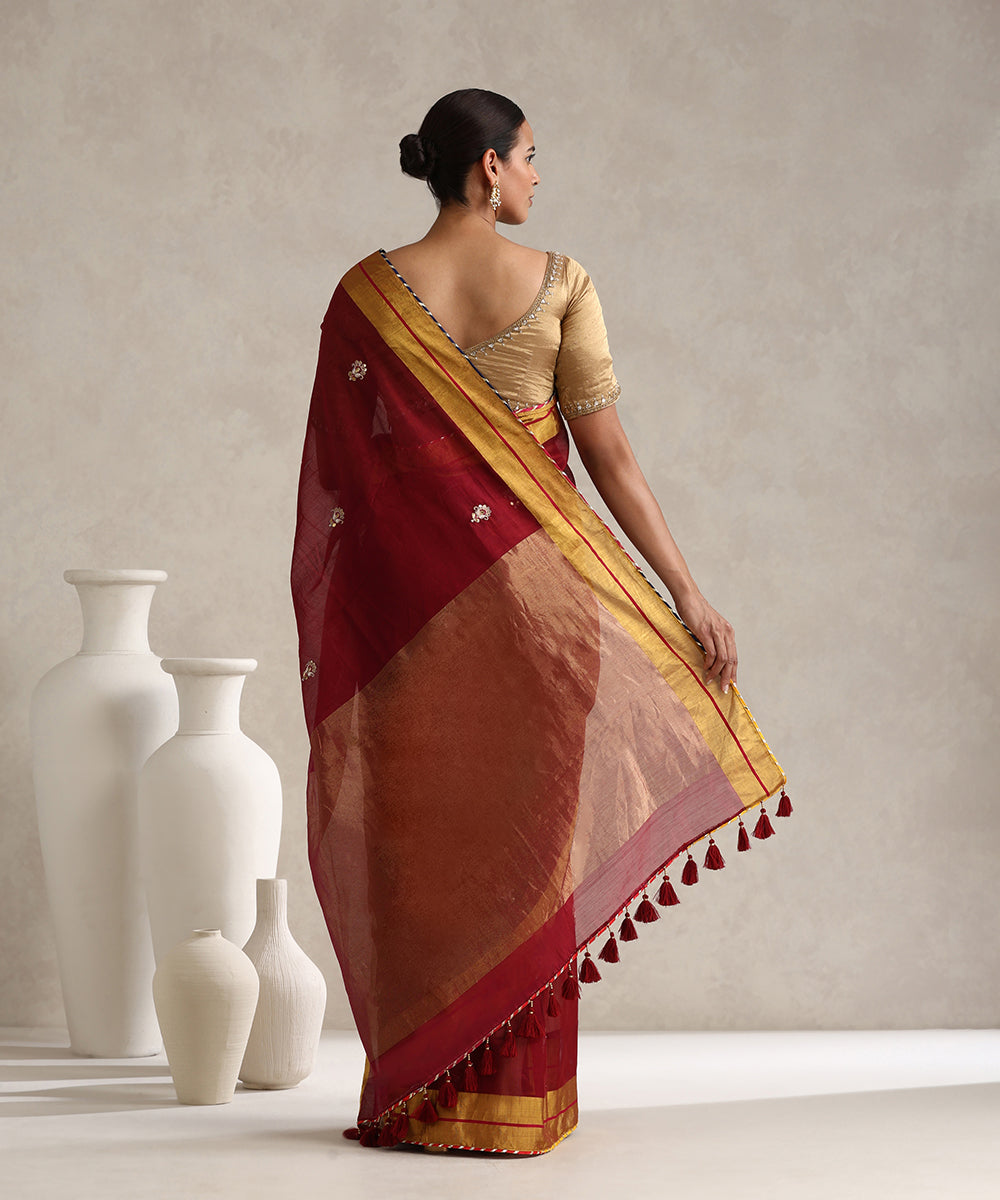 Maroon_Handloom_Pure_Chanderi_Saree_With_Small_Hand_Embroidered_Booti_And_Lace_WeaverStory_03