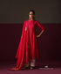 Model wearing Inaya, a hot pink Chanderi suit with rangoli boota dupatta and ivory straight pants