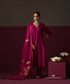 Model wearing Ambreen, a deep magenta Chanderi suit with panelled kurta and gota patti ambi dupatta