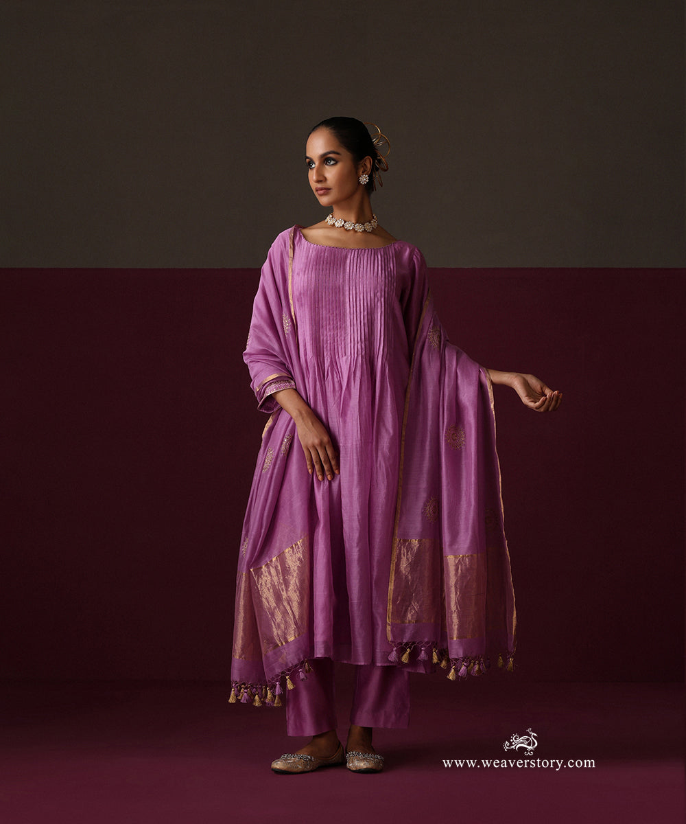 Front view of the orchid purple pleated kurta with matching pants and a gold-bordered embroidered dupatta