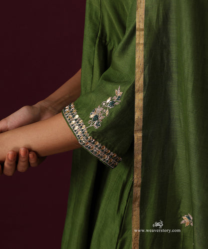 Detail of the embroidered sleeve cuff and floral motif on the Heena green dupatta