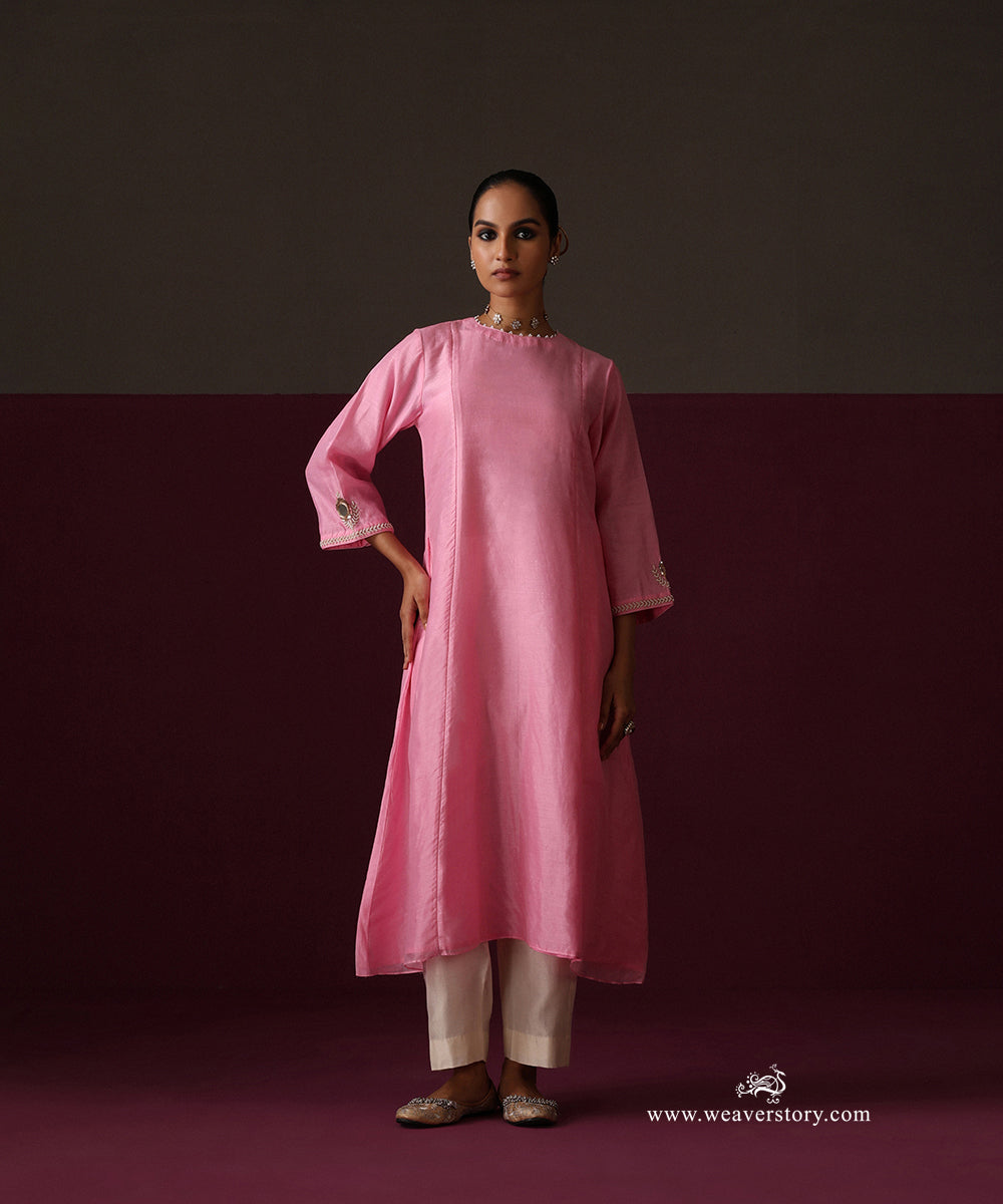 Full-length view of the flared pink Chanderi kurta with straight ivory pants