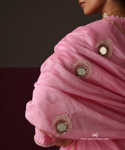 Close-up of mirror, zardozi and pearl motifs on the sheer pink Chanderi dupatta