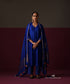 Royal blue Chanderi pants beneath a kurta, with gold-striped dupatta ends and colourful tassels