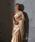 Padmika gold Tissue Organza saree with vintage Katan silk Banarasi border featuring zari, floral and paisley motifs with meenakari accents.