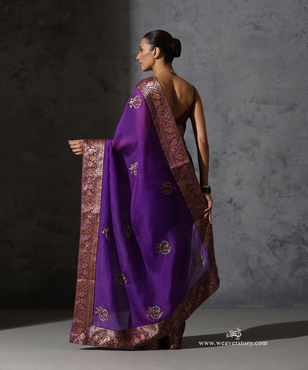 Back view of Vaijayanti purple pure silk organza saree displaying scattered meenakari bootis and vintage handwoven Banarasi zari border