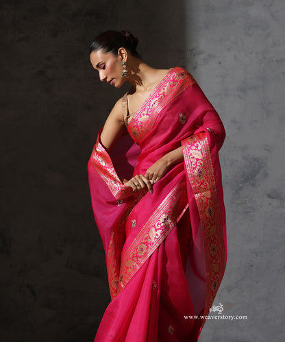 Vasundhara hot pink pure silk organza saree with hand-embroidered zardozi bootis and vintage Banarasi meenakari border.
