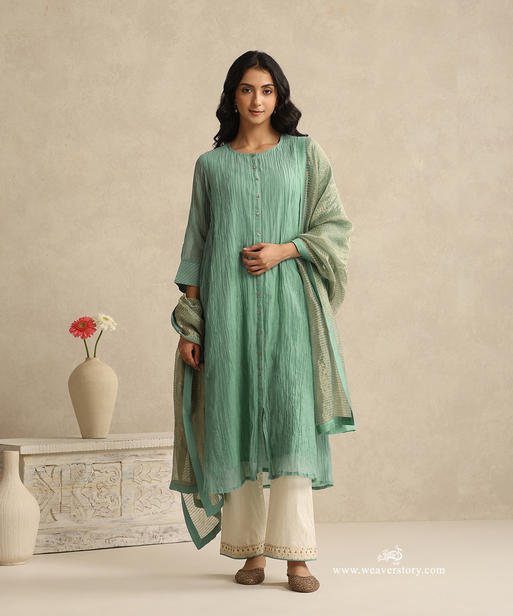 Light_Blue_Handloom_Mul_Chanderi_Suit_Set_With_Ivory_Hand_Embroiderd_Pant_And_Stripe_Tissue_Dupatta_WeaverStory_01