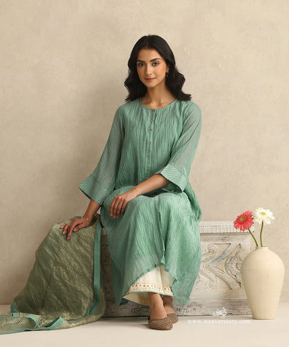 Light_Blue_Handloom_Mul_Chanderi_Suit_Set_With_Ivory_Hand_Embroiderd_Pant_And_Stripe_Tissue_Dupatta_WeaverStory_02