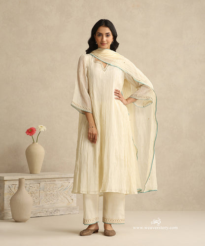 Ivory_Handloom_Mul_Chanderi_Suit_Set_With_Hand_Embroidery_And_Blue_Piping_WeaverStory_02