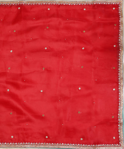 Full view of red organza dupatta with evenly placed floral bootis and an intricate resham and zardozi border