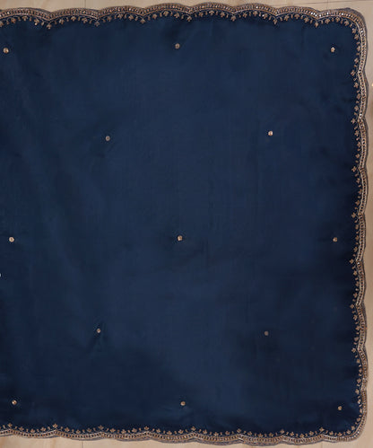 Full view of teal blue silk organza dupatta with evenly spaced zardozi bootis and an ornate hand-embroidered scalloped border.