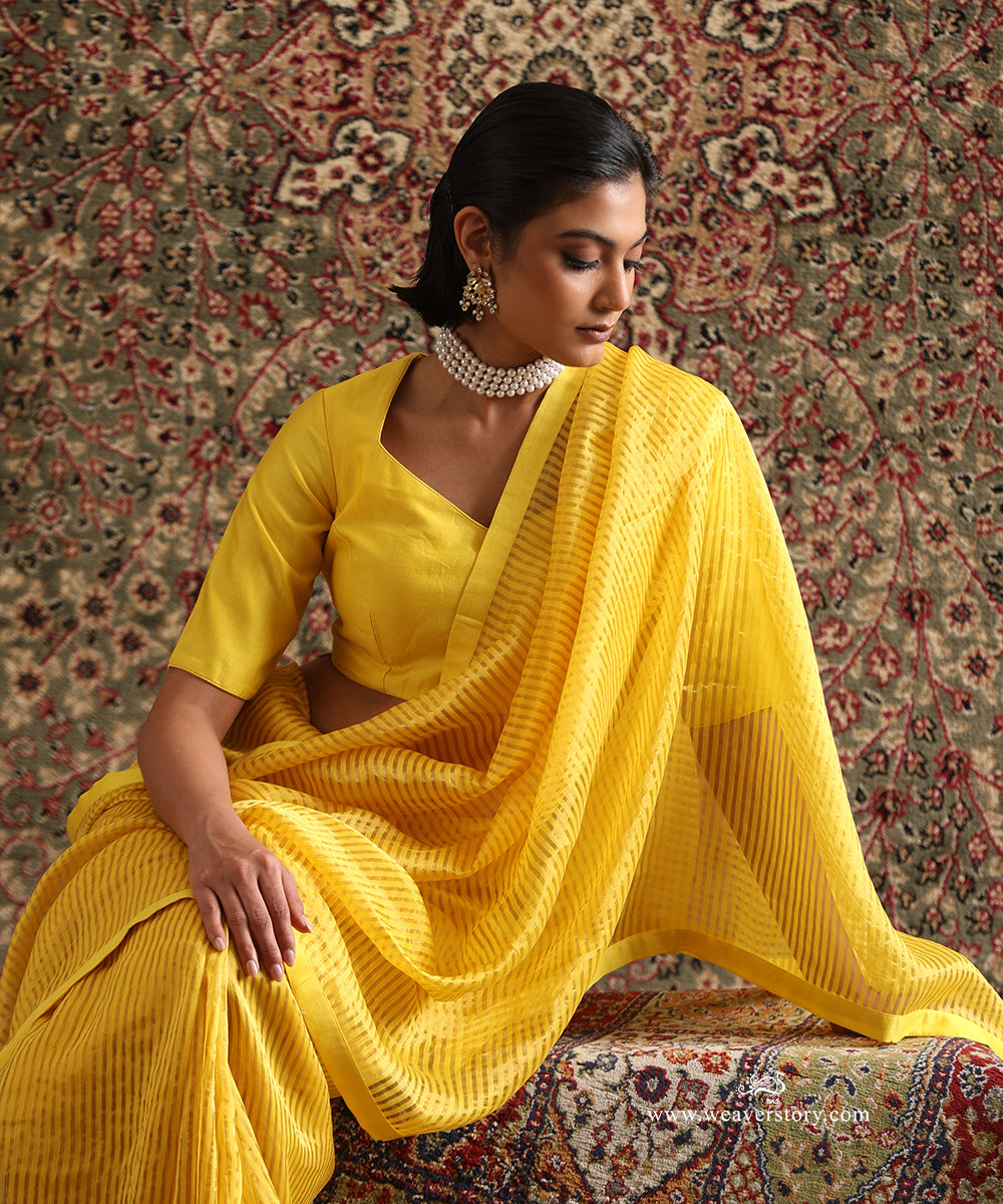 Solstice Yellow Striped Tissue Saree With Chanderi Finishing from Antara by WeaverStory