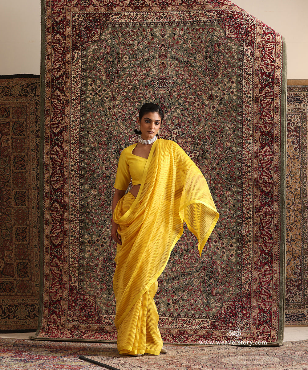Solstice Yellow Striped Tissue Saree With Chanderi Finishing from Antara by WeaverStory