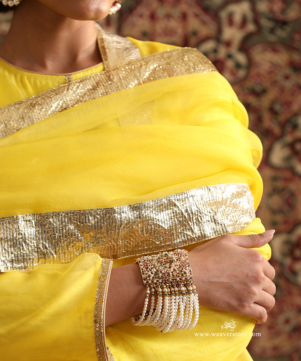 Front View of Yellow Pure Silk Organza Lehenga Set with Hand Embroidered Kurta, Flowing Lehenga and Handcrafted Lampi Gota Border Dupatta