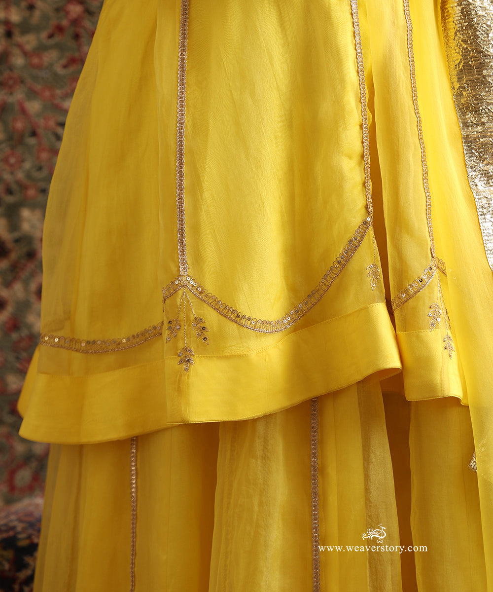 Close-Up of Hand Embroidery and Gota Lace Detailing on Yellow Pure Organza Kurta and Lehenga