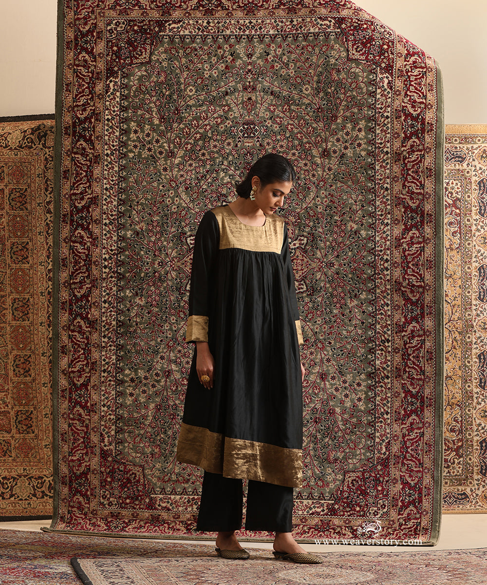 Black Pure Chanderi Silk High-Low Anti-Fit Kurta Set with gold tissue yoke and broad-leg Chanderi silk pants