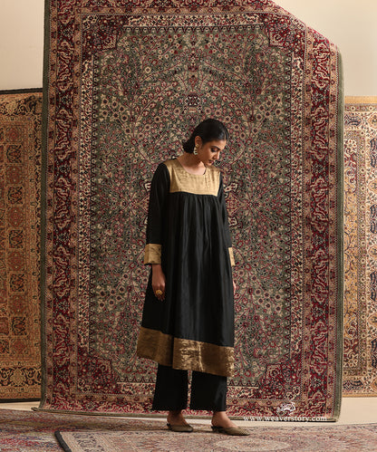 Black Pure Chanderi Silk High-Low Anti-Fit Kurta Set with gold tissue yoke and broad-leg Chanderi silk pants