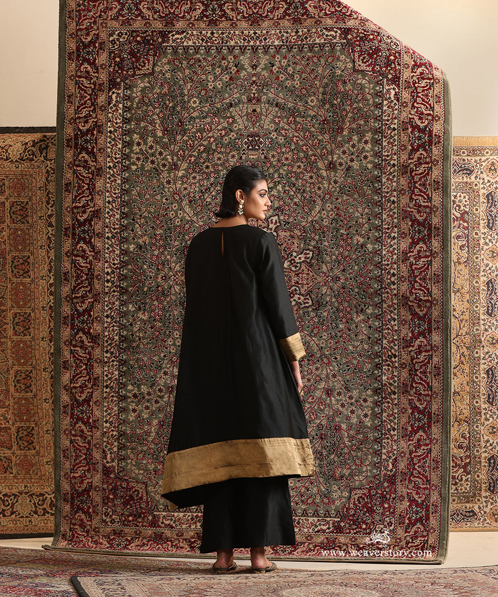 Back view of Black Pure Chanderi Silk High-Low Anti-Fit Kurta with gold tissue yoke and broad tissue hem detailing