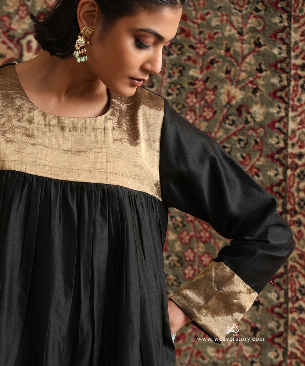 Detail of the Black Pure Chanderi Silk High-Low Kurta showcasing the broad gold tissue yoke and cuffs
