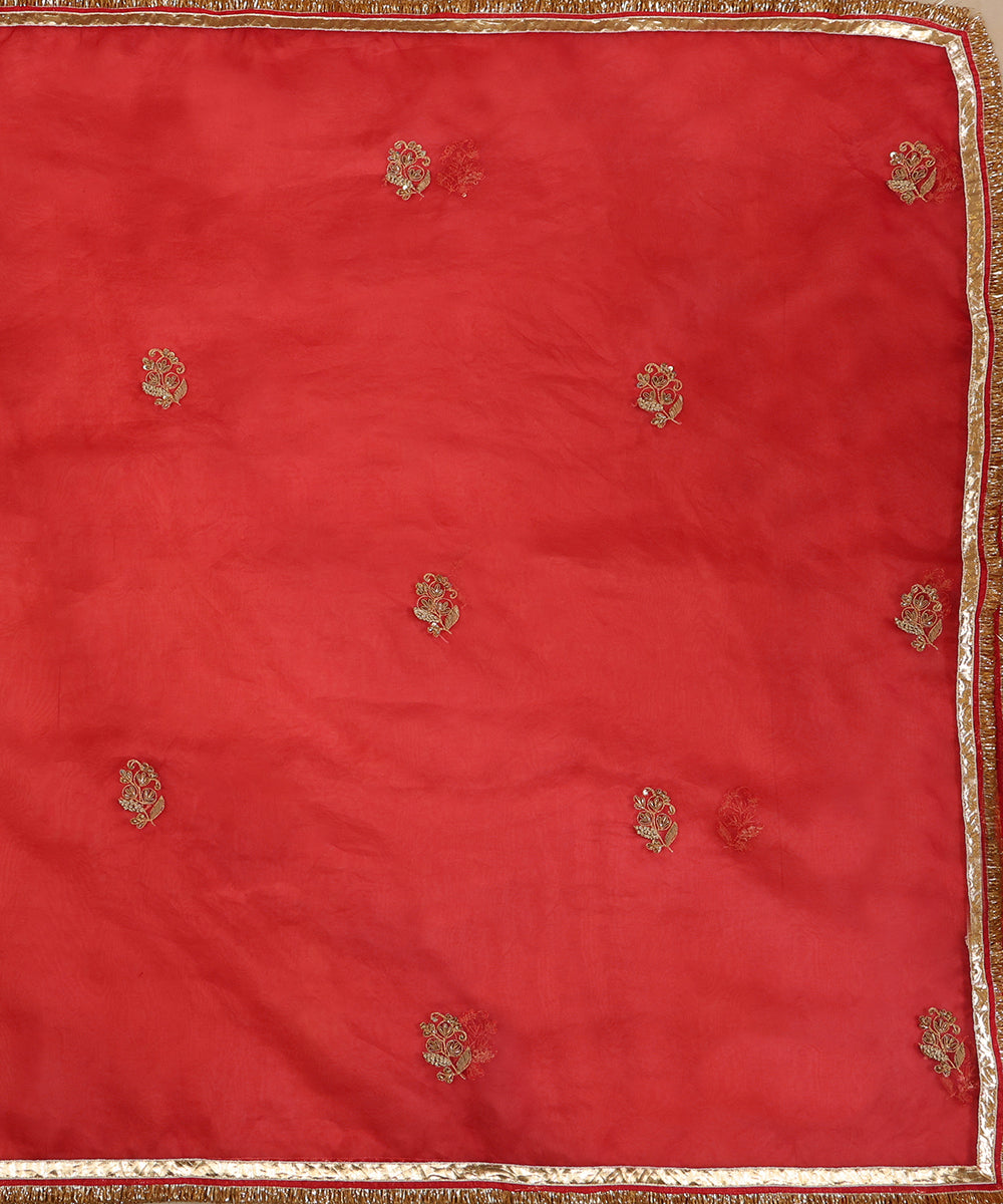 Full view of red organza dupatta featuring evenly placed zardozi farisha motifs and a gota border with kiran finishing.