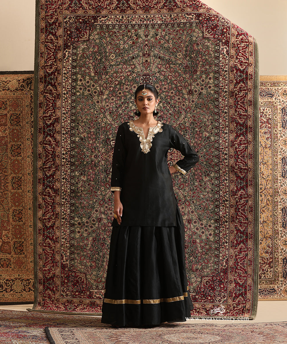 Black pure Chanderi silk kurta with gathered skirt featuring a gold tissue detail and handcrafted zardozi neckline