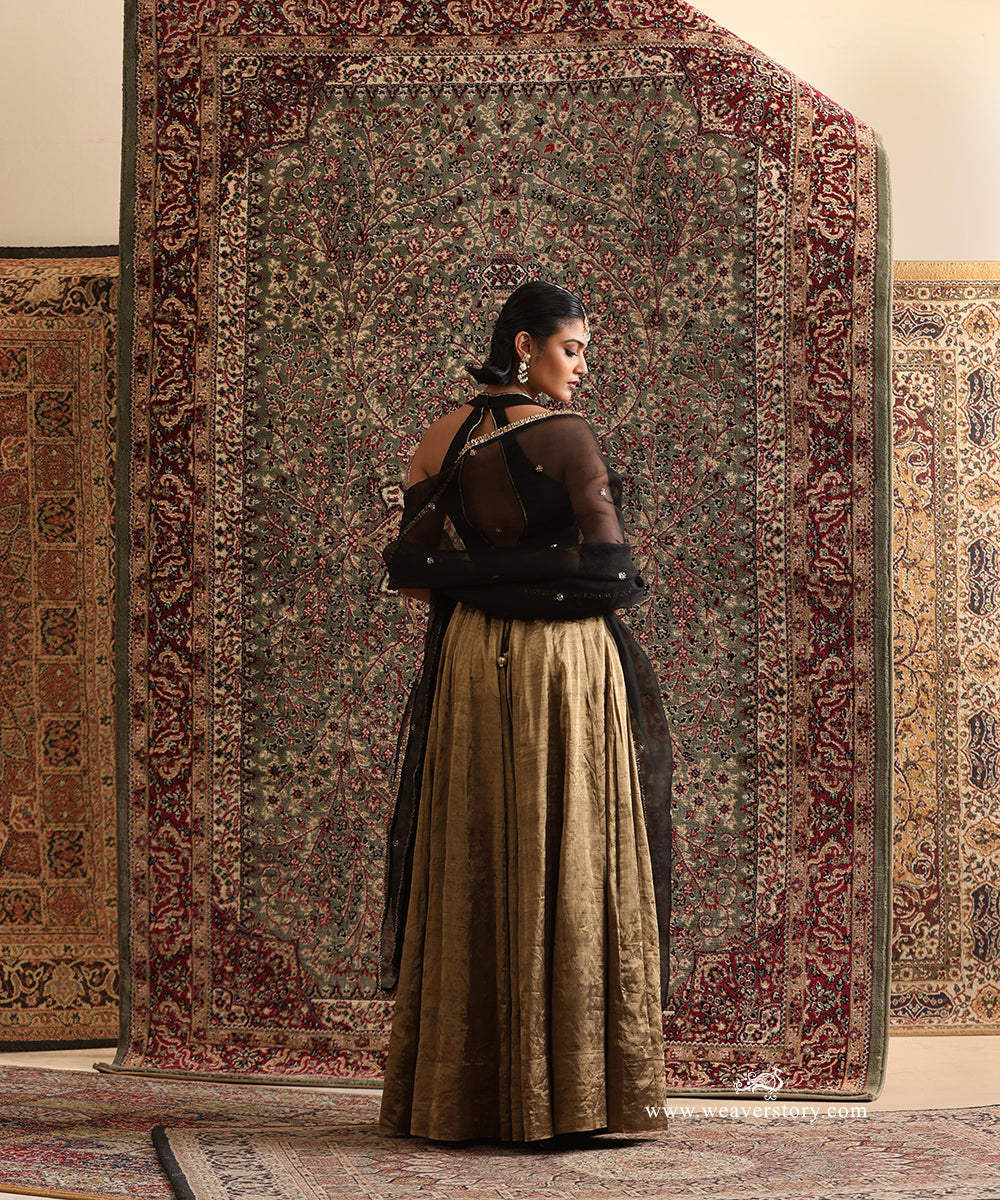Black Chanderi silk blouse with antique gold tissue lehenga and hand embroidered organza dupatta