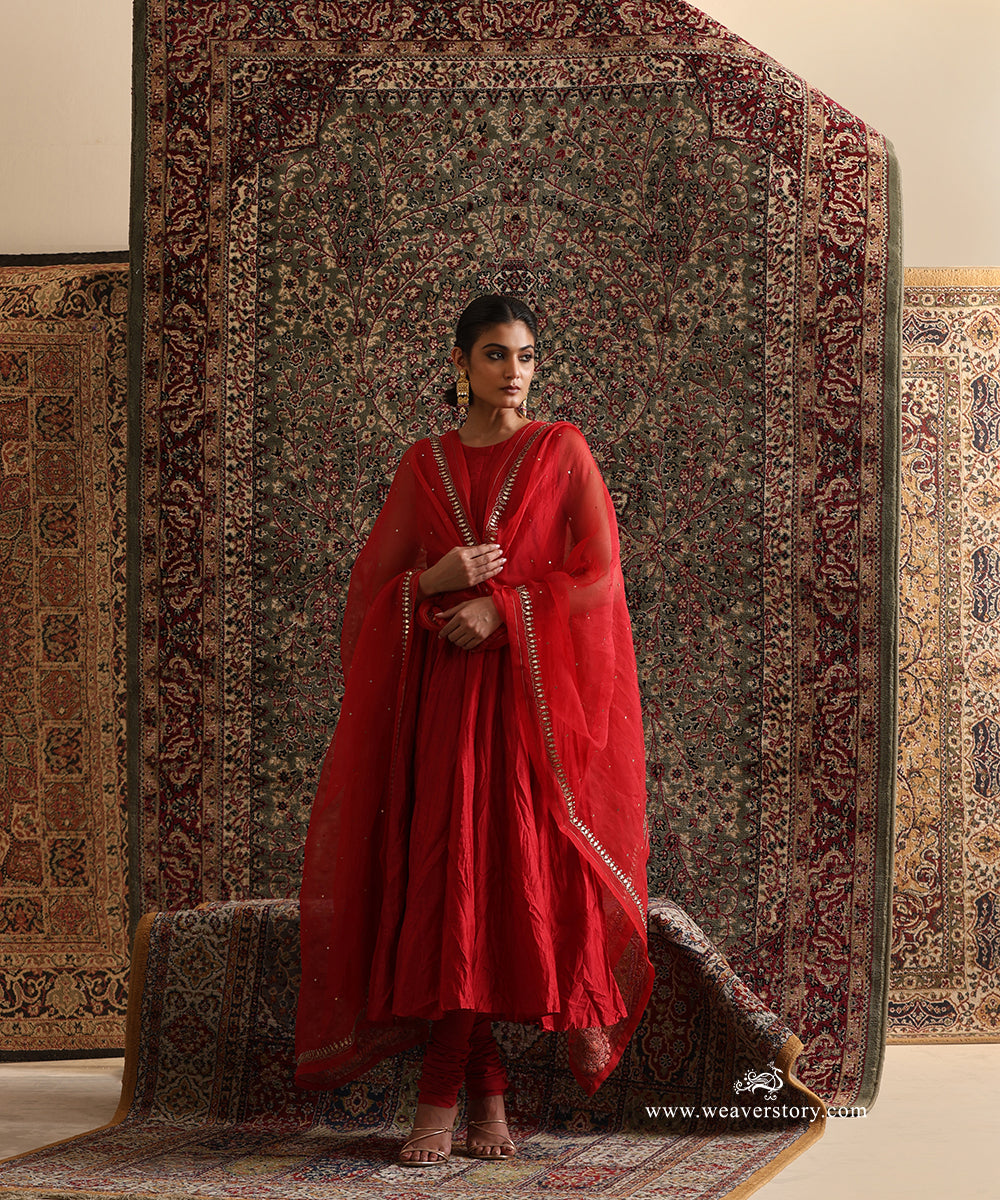 Red organza dupatta with gota embroidered border and scattered gota motifs