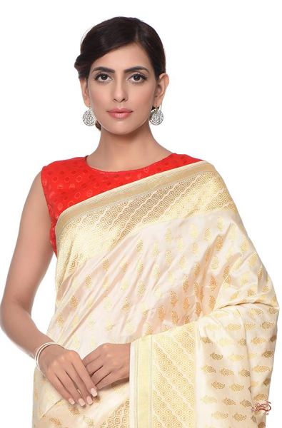 Ivory_and_gold_Kadhwa_Banarasi_Saree_with_traditional_paisley_Bootis_and_a_rich_konia_Pallu_WeaverStory_01