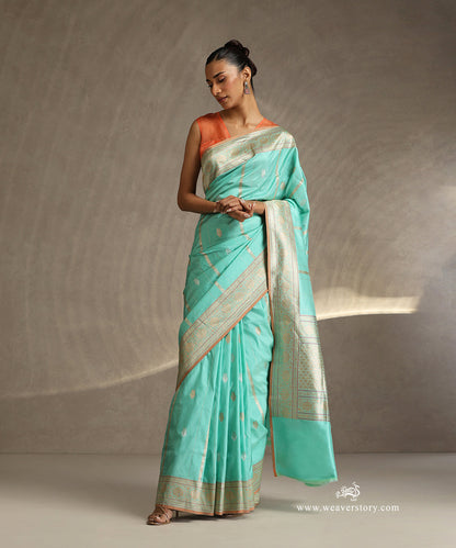 Pastel_Green_Handloom_Pure_Katan_Silk_Banarasi_Saree_With_Vertical_Stripes_WeaverStory_02