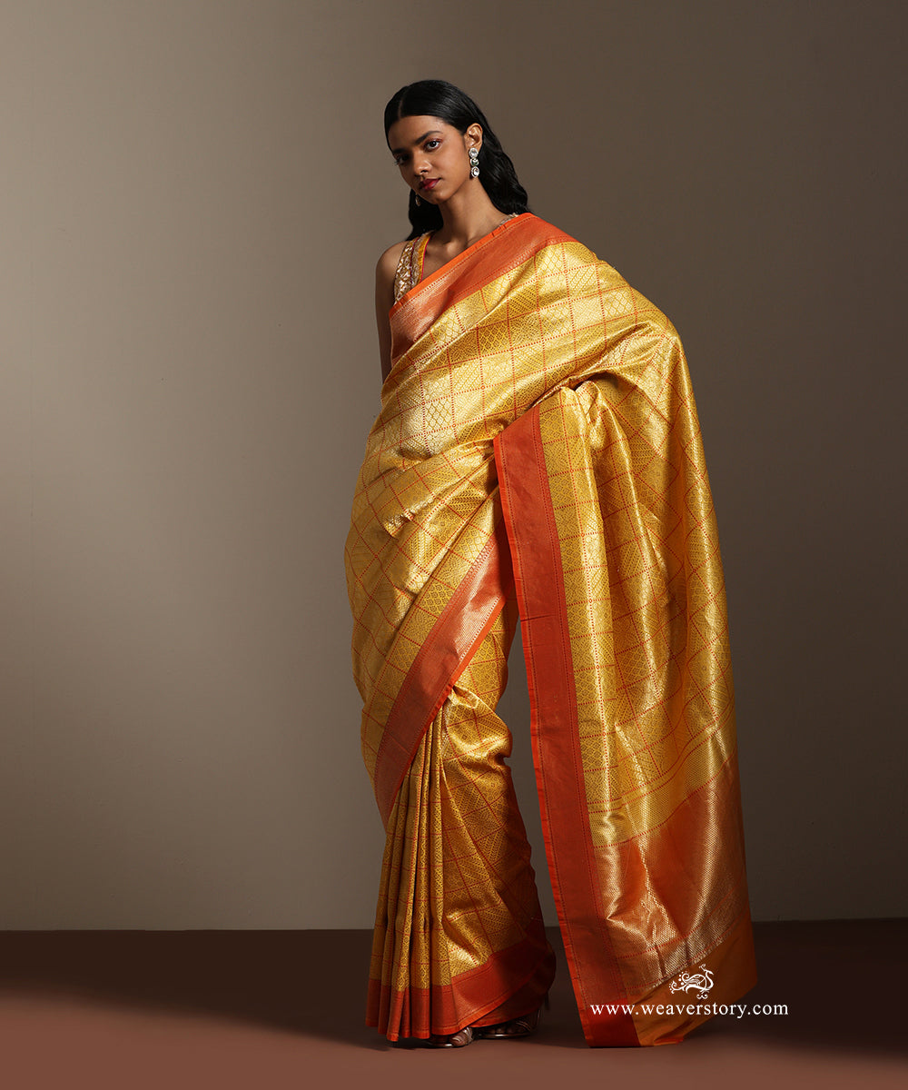 Yellow_Banarasi_Brocade_Saree_With_Orange_Contrast_Border_WeaverStory_01