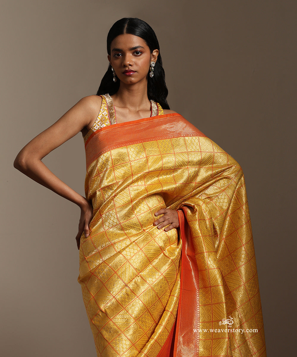 Yellow_Banarasi_Brocade_Saree_With_Orange_Contrast_Border_WeaverStory_02