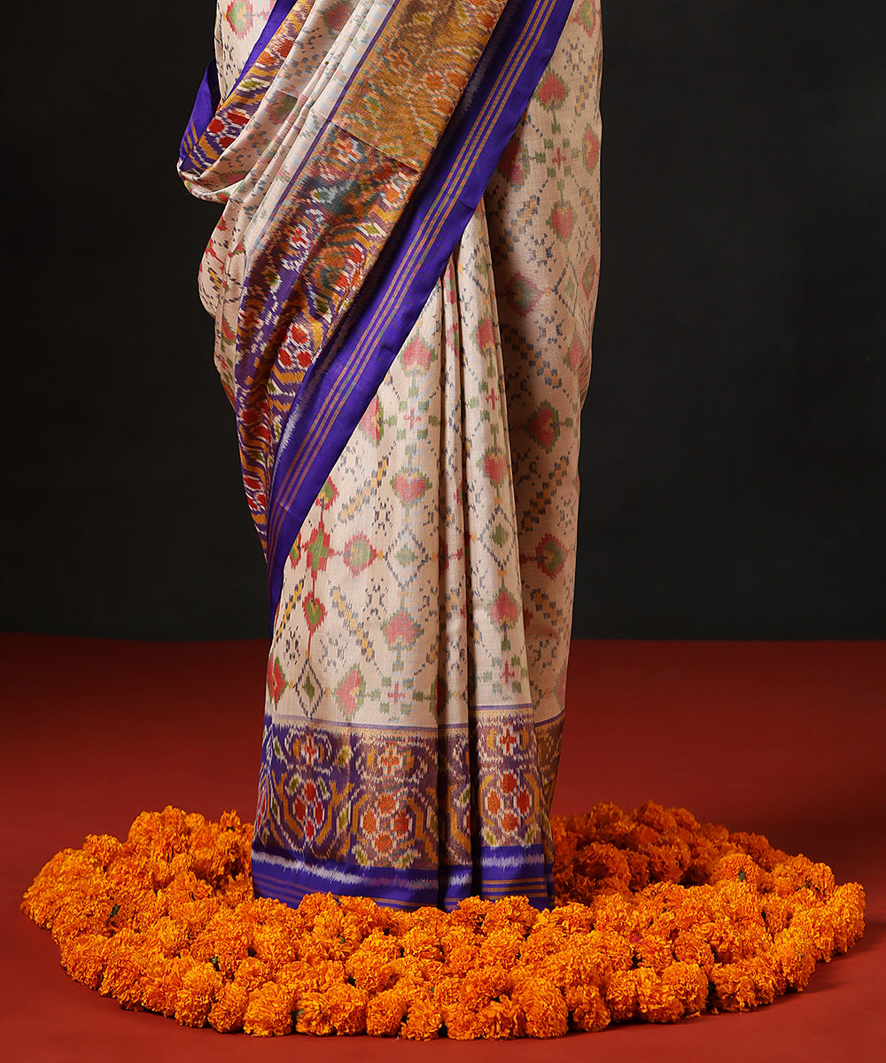 Off White Double Shade Handloom Pure Mulberry Silk Single Ikat Patola Saree With Blue Tissue Border