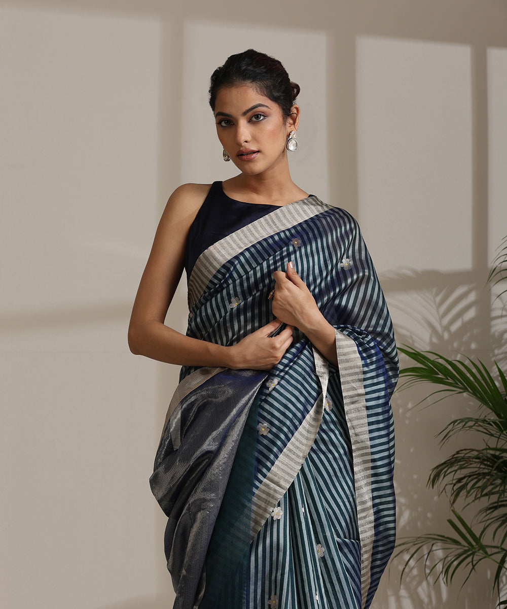 Handloom_Teal_Double_Shade_Silver_Striped_Pure_Chanderi_Silk_Saree_With_All_Over_Flower_Booti_WeaverStory01