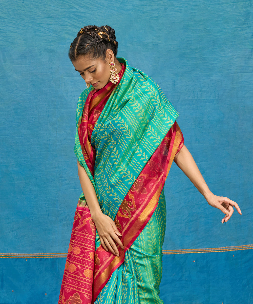 Handloom_Aqua_Blue_Pure_Mulberry_Silk_Ikat_Patola_Saree_With_Pink_Border_And_Palla_WeaverStory_02
