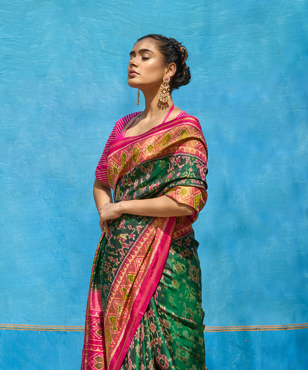 Handloom_Green_And_Pink_Pure_Mulberry_Silk_Ikat_Patola_Saree_With_Pink_Border_And_Palla_WeaverStory_02