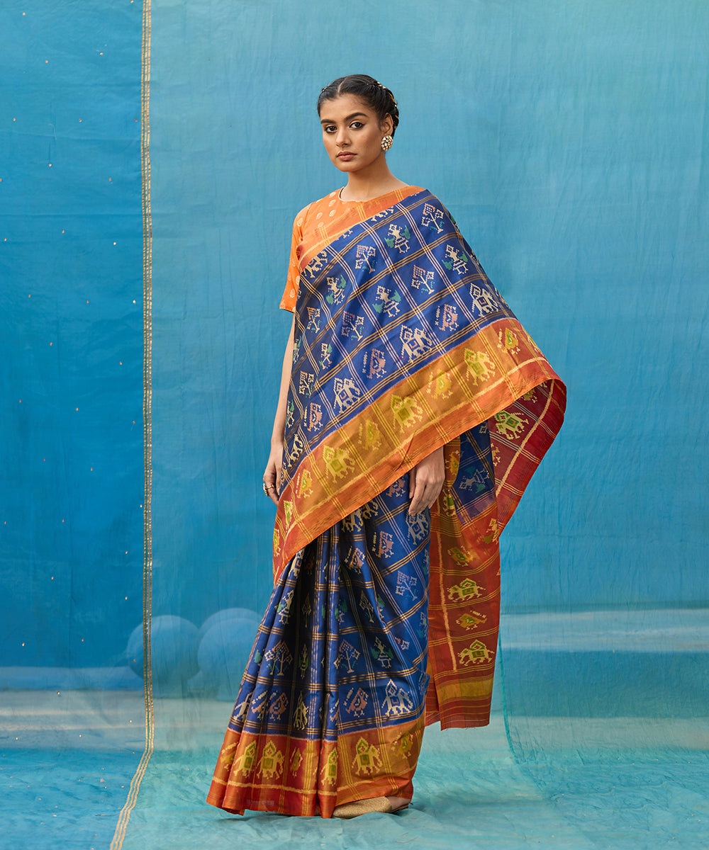 Blue_And_Rust_Handloom_Pure_Mulberry_Silk_Ikat_Patola_Saree_With_Checks_WeaverStory_01