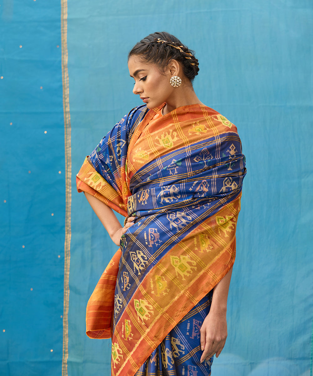 Blue_And_Rust_Handloom_Pure_Mulberry_Silk_Ikat_Patola_Saree_With_Checks_WeaverStory_02